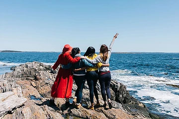 4 women standing at the big stairs in Harpswell Maine4 women standing at the big stairs in Harpswell Maine