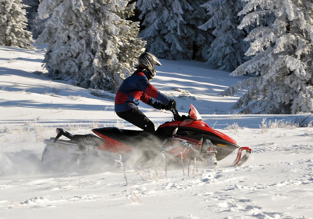 Snowmobiling in fresh snow