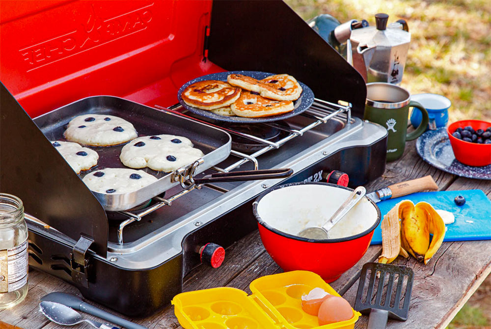 Blueberry pancakes on a camp stove