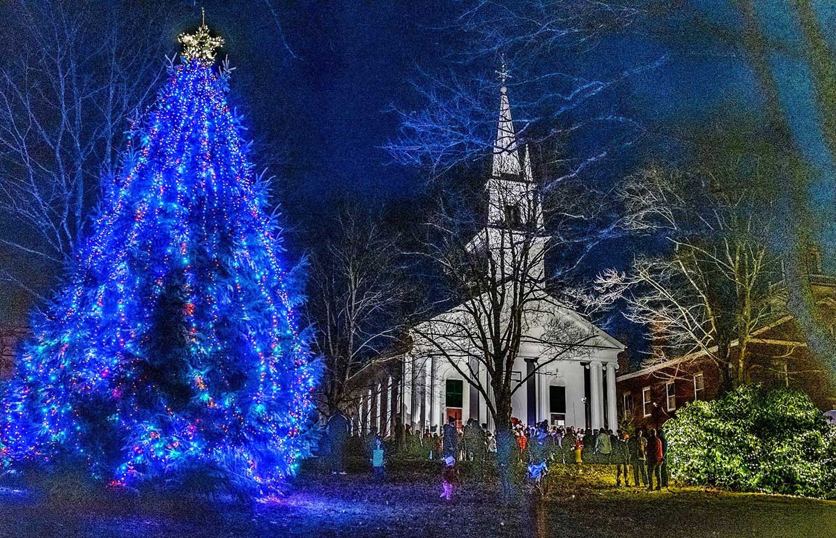 Wiscasset Holiday Marketfest, lit up Christmas tree and church at night, Wiscasset, Maine